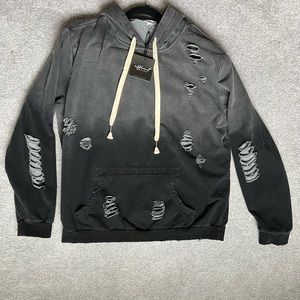 Off beat native oversized distressed Hoodie. Women’s size small.